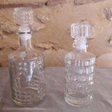 Set of 2 chiseled glass liquor decanters