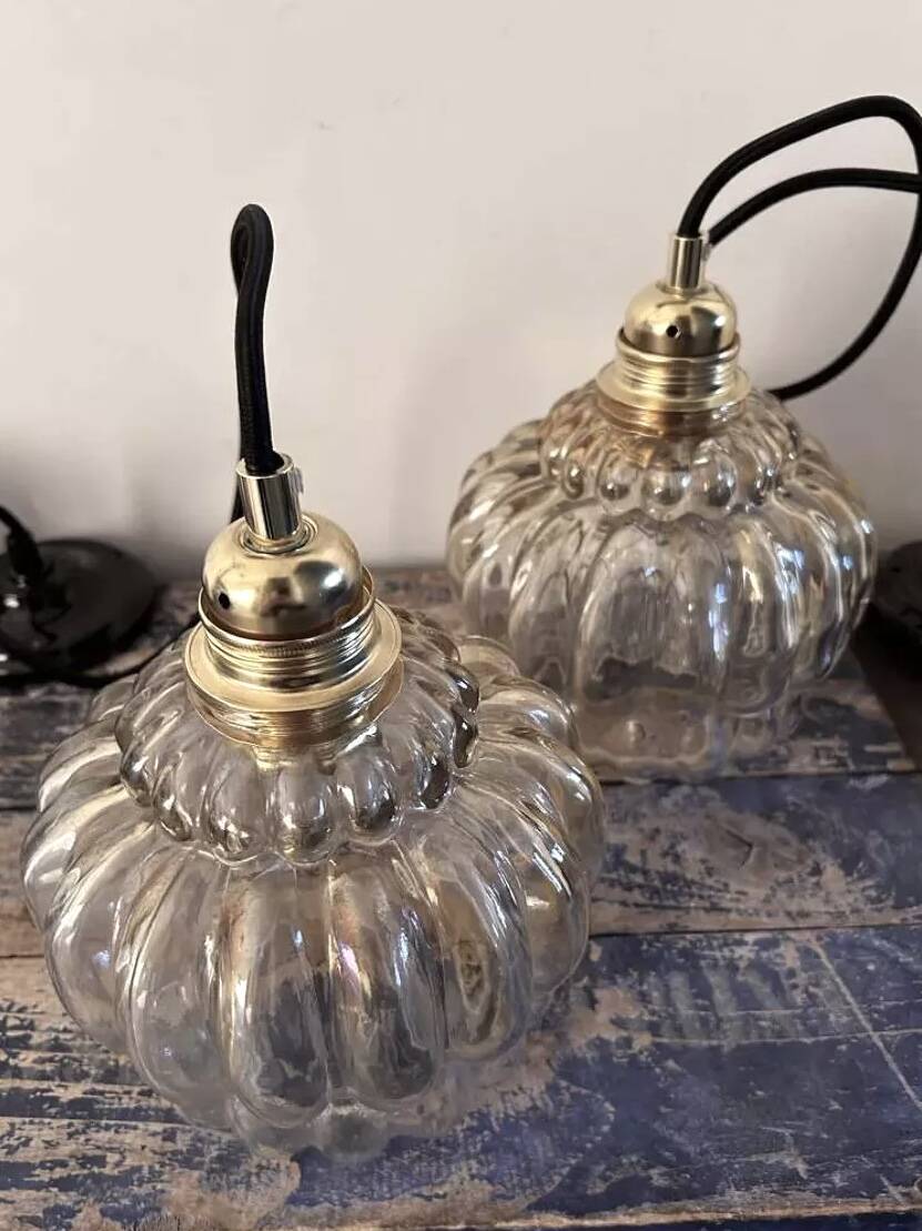 Pair of vintage amber glass pendant lights