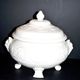 Rare Wedgwood "Patrician" molded opaque earthenware tureen, garland mascaron, England