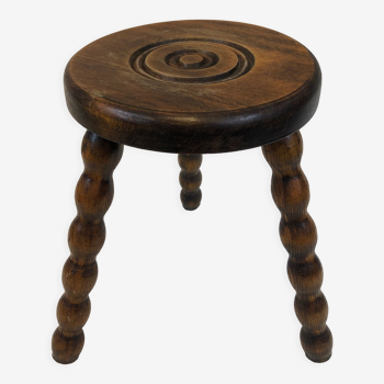 Dark turned wood tripod stool