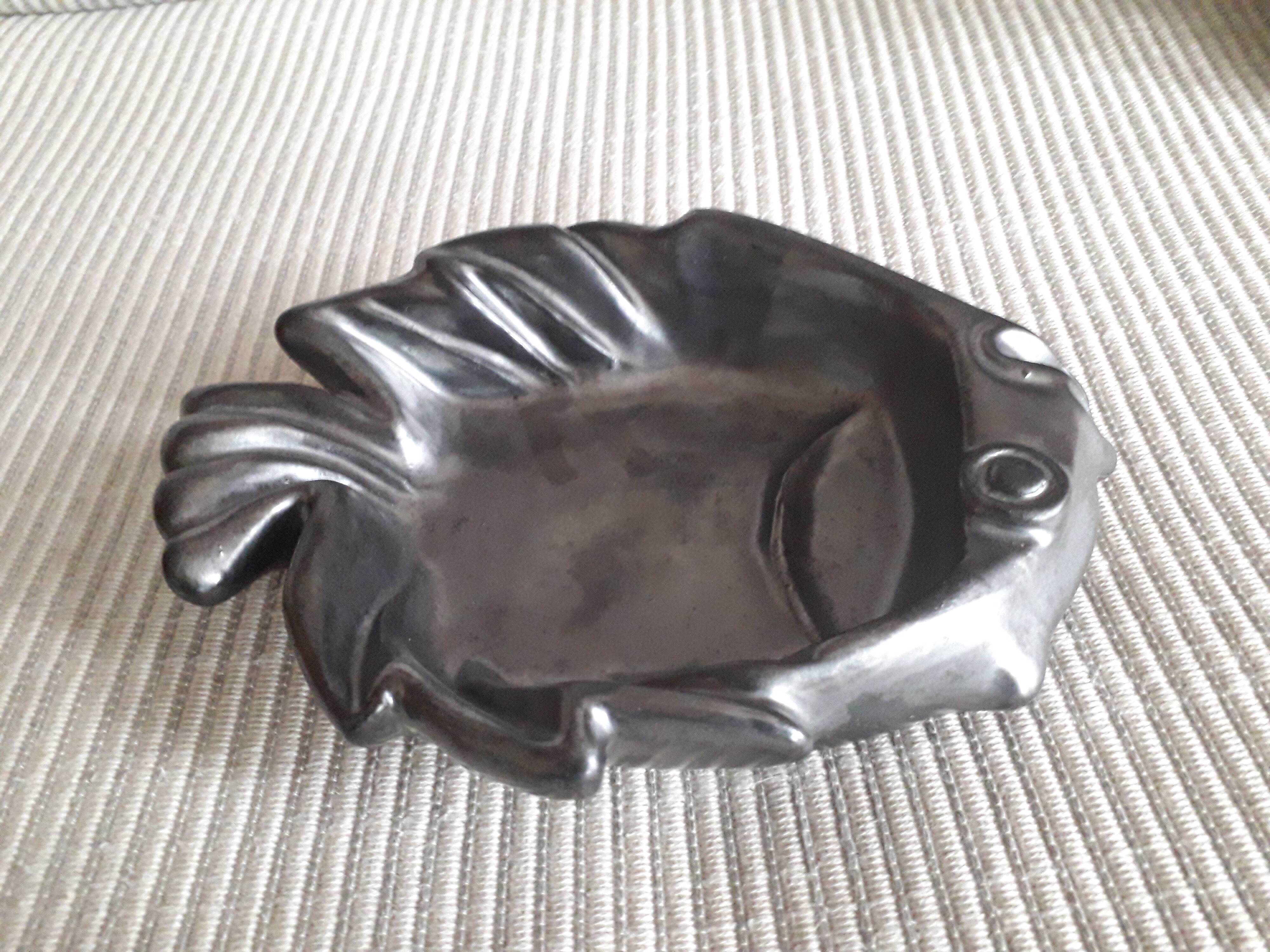 Vallauris fish-shaped pocket emptier