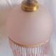 Hanging bell and pink glass garland