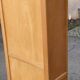 Armoire parisienne vitrée en bois clair 1960