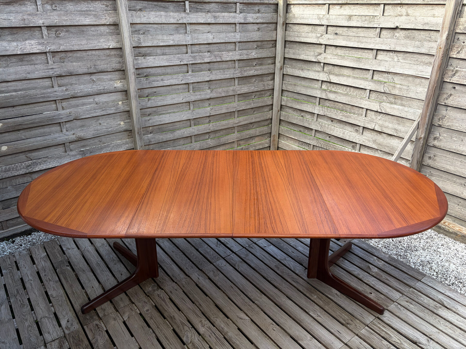 Oval teak table extendable with two leaves, Baumann style.