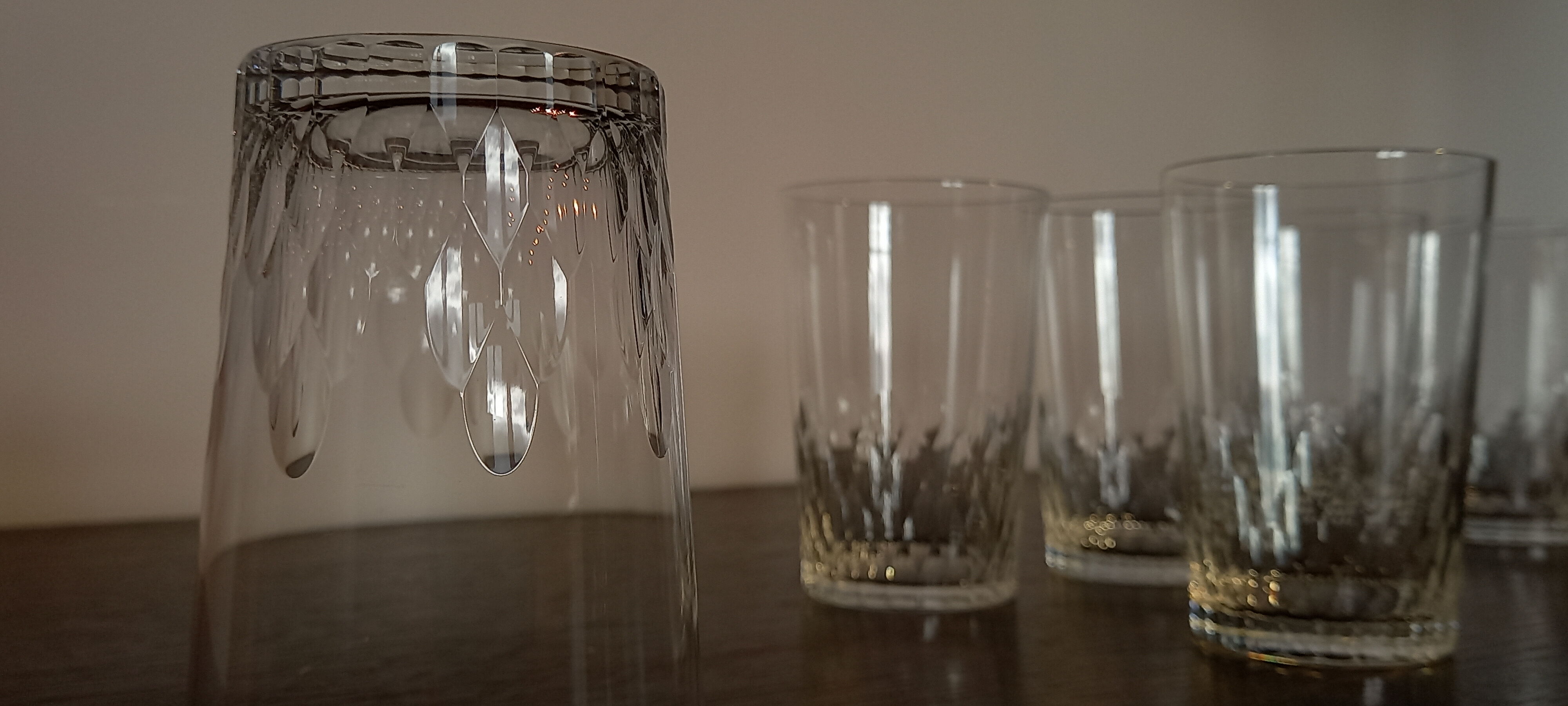 8 Baccarat crystal footless glasses, cut with facets