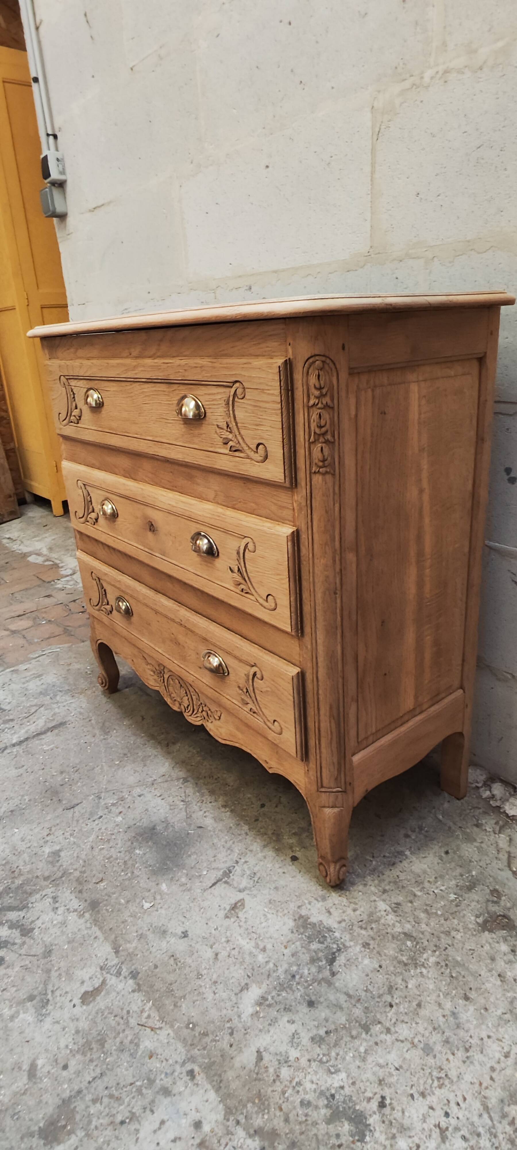 Old chest of drawers with three drawers in raw solid oak
