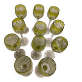 Set of 11 large crystal wine glasses on stems.