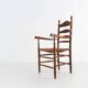 Antique wooden armchair with cane seat, France ca. 1900