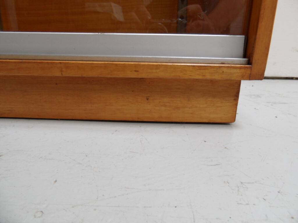 Vintage shop display cabinet with sliding doors