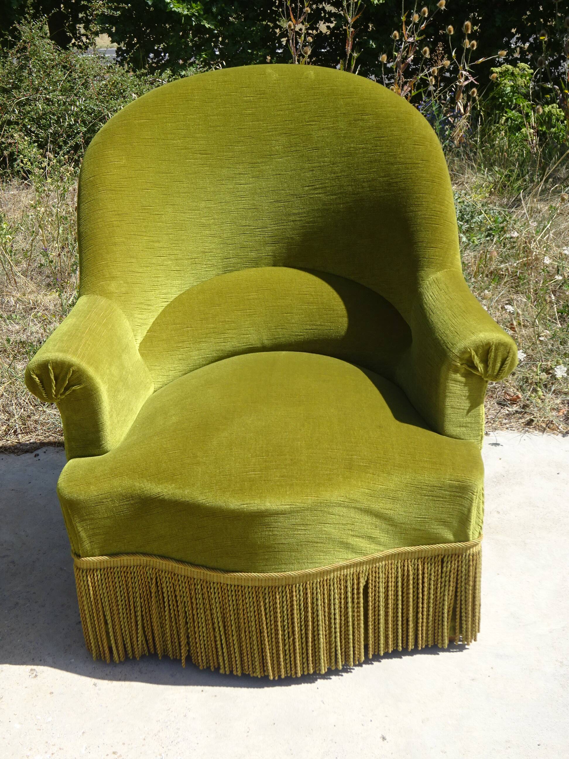 Paire de fauteuils crapauds en velours vert