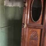 Very decorative coat rack with bevelled mirror.