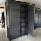 Large black wooden wardrobe