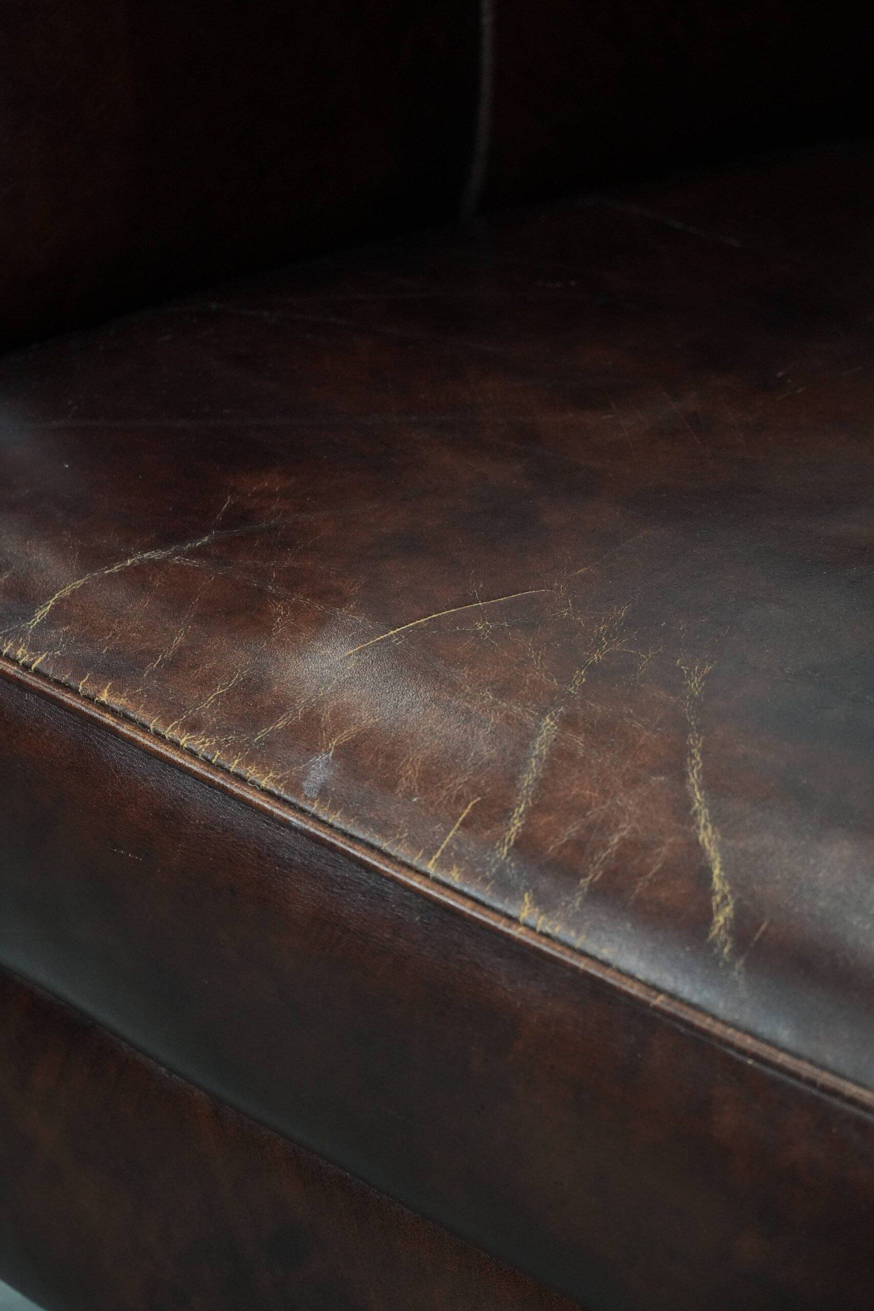 Characterful and comfortable cowhide leather armchair