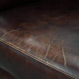 Characterful and comfortable cowhide leather armchair
