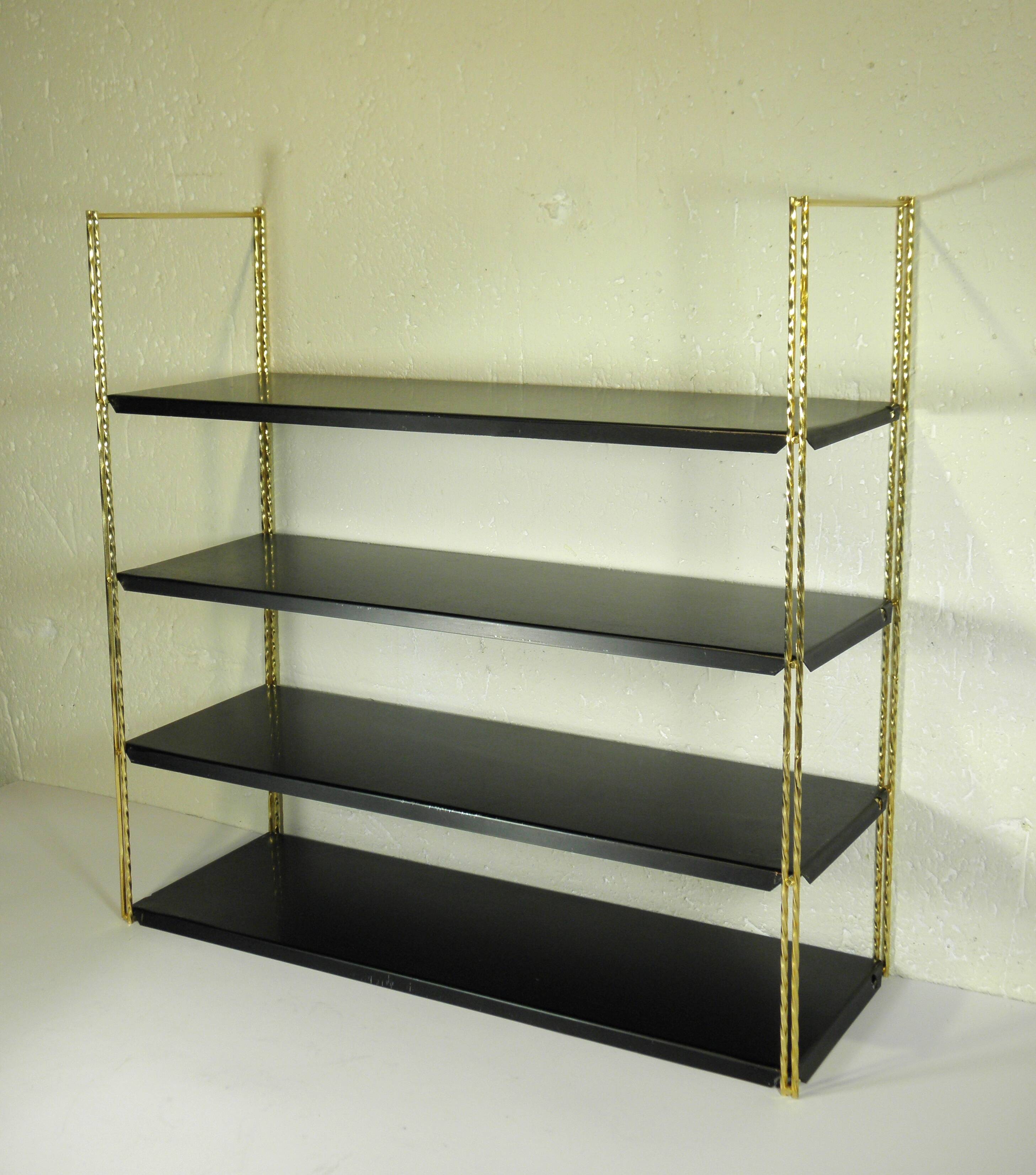 Black and gold metal wall shelf from the 1960s
