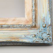 Wooden frame in Louis XV style. Baroque frame. Style of the frame.