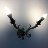 Paire d'appliques murales style Empire double feux en bronze