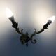 Pair of double-light Empire style wall lights in bronze