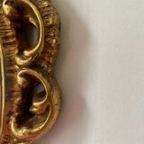 Golden rockery mirror