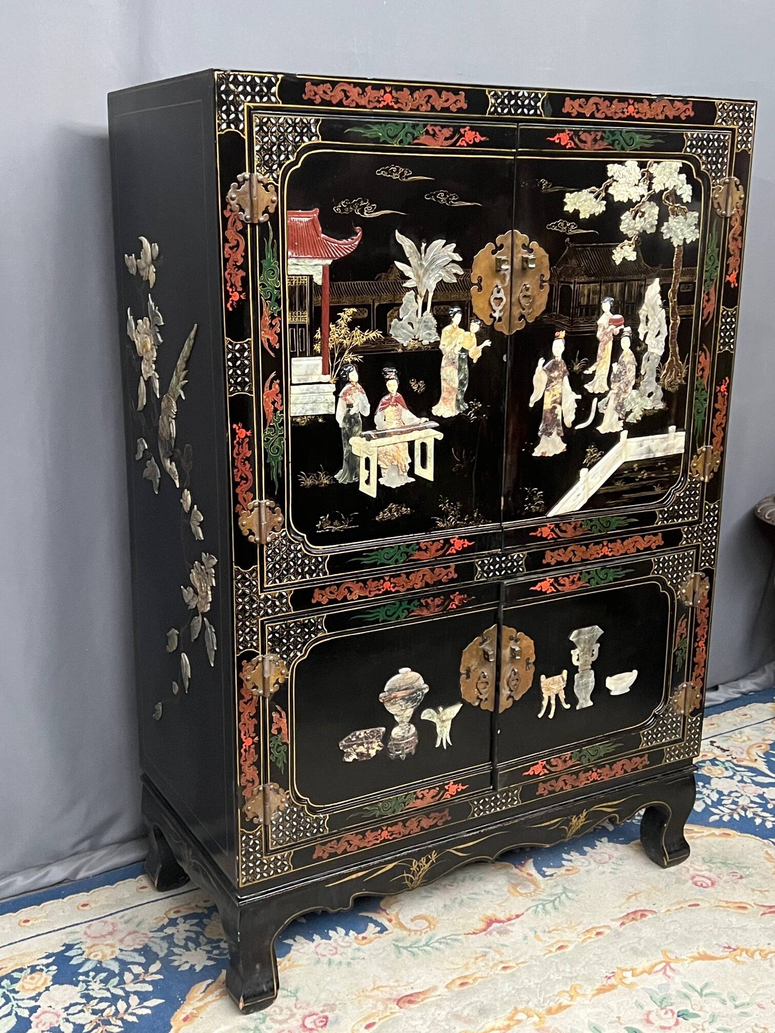 Chinoiserie-style cabinet. Inlaid with steatite, jade, marble, and ivory.
