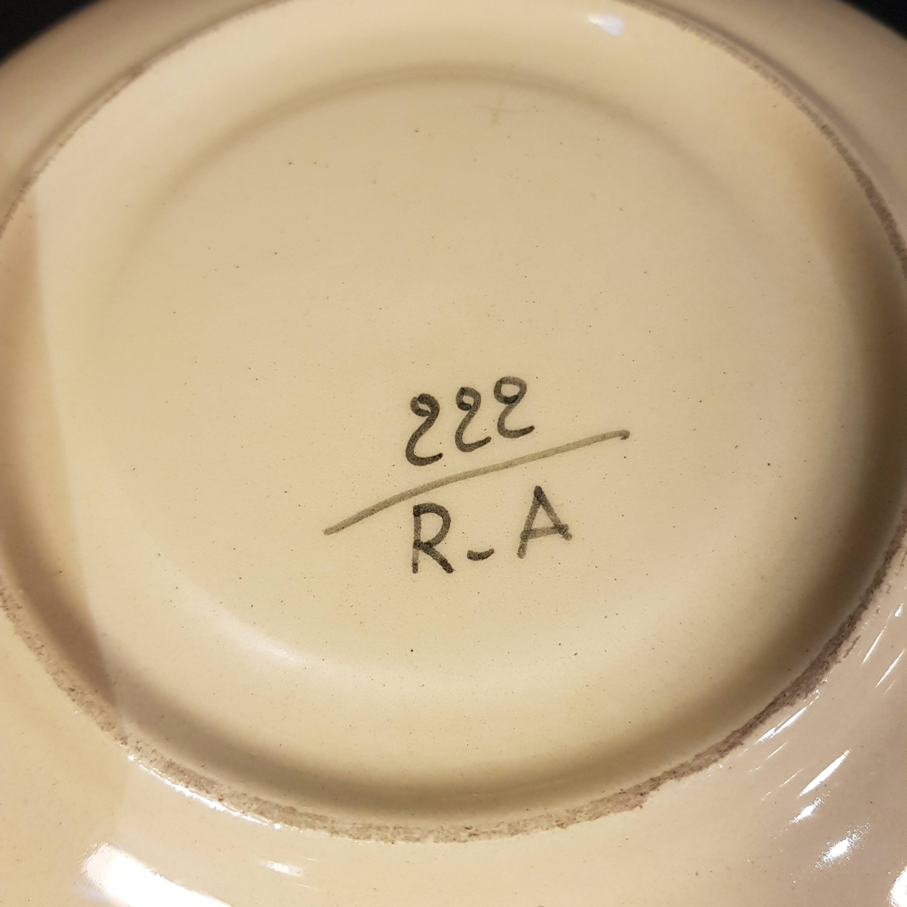 4 Quimper earthenware saucers or plates