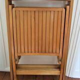 Pair of folding chairs with vintage solid wood slats