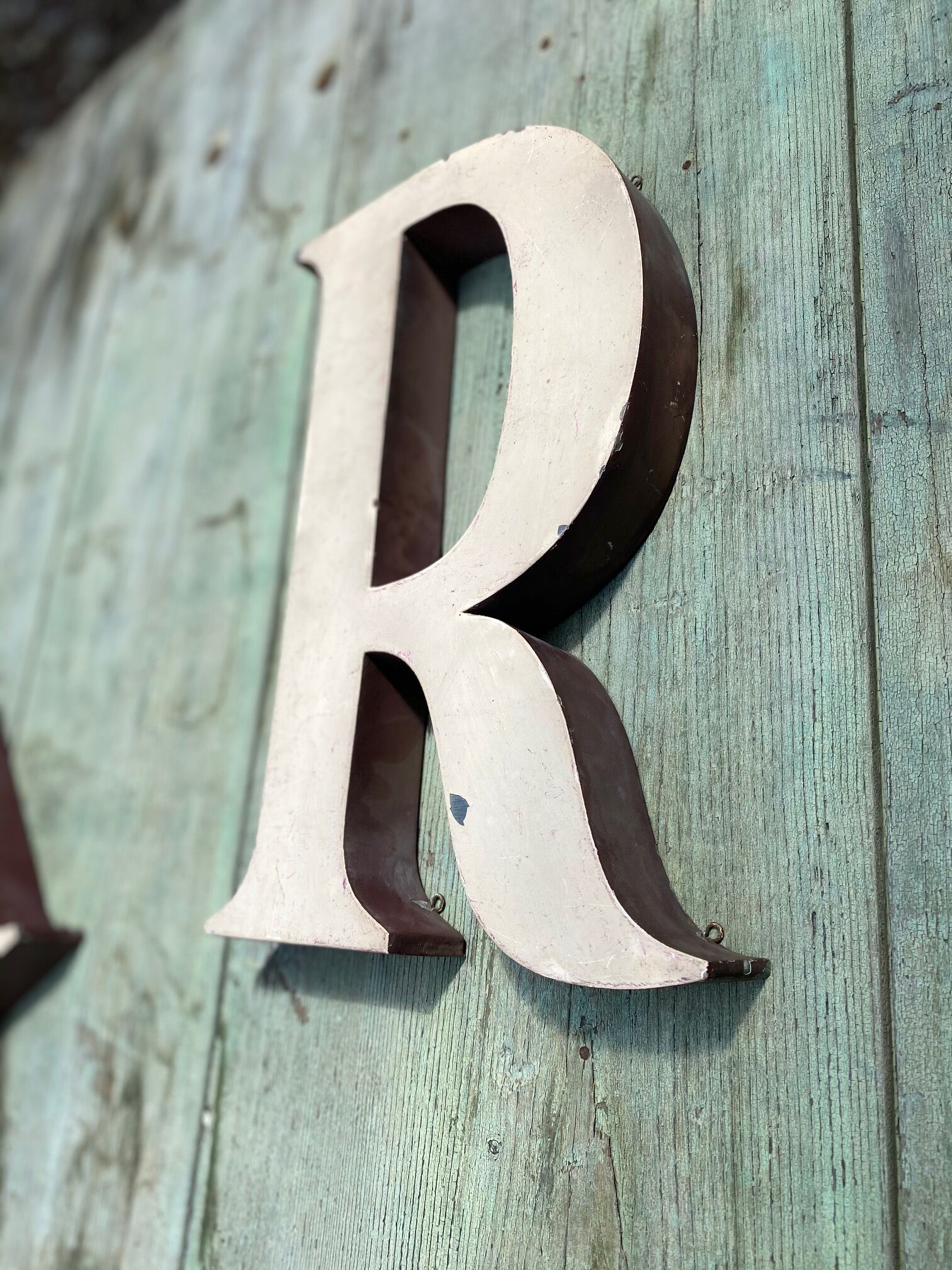 Sign letters forming the word "art"