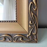 Beautiful French vintage mirror in gilded wood from the 60s