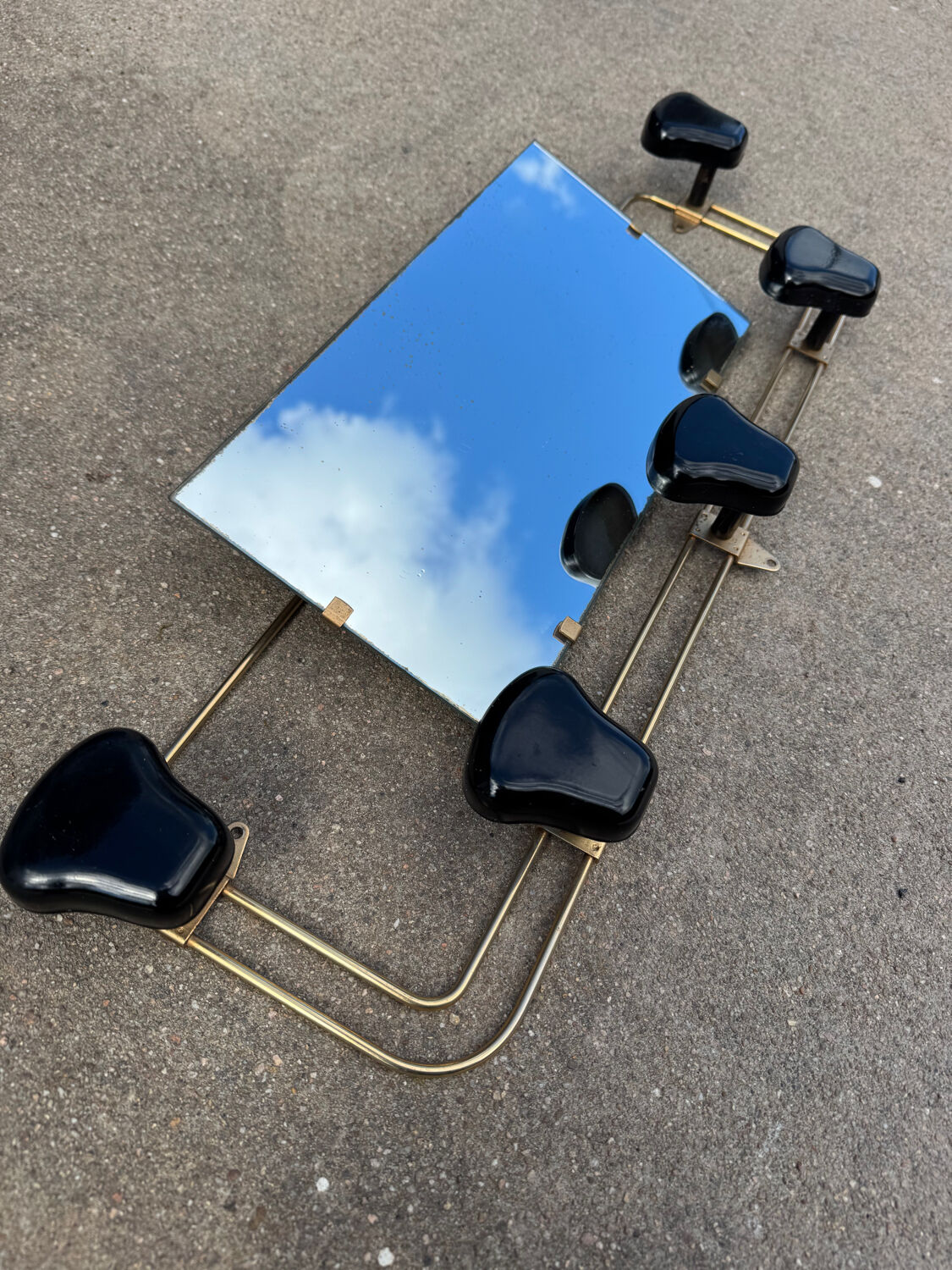 Wall-mounted coat rack mirror from the 1960s.