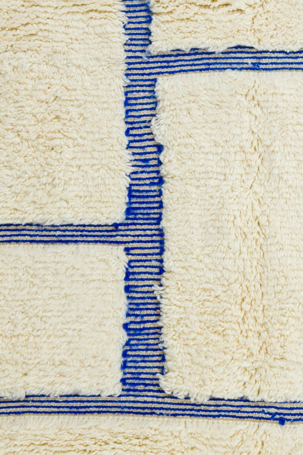 White and blue Klein Beni Ouarain Moroccan rug