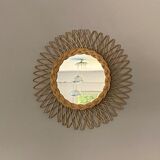 Sun mirror in braided rattan. 1960. 50cm.
