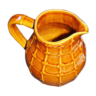 Pitcher in faience of saint clement