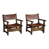 Pair of Spanish brutalist armchairs from the 1960s, wood and leather.