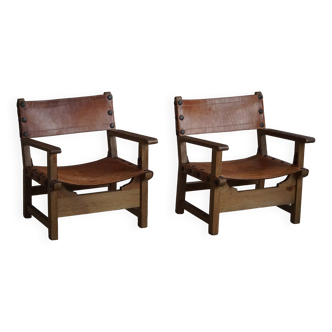 Pair of Spanish brutalist armchairs from the 1960s, wood and leather.