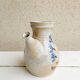 Marais stoneware pitcher, floral decoration