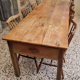 Solid oak farmhouse table, a drawer, vintage, early twentieth century.