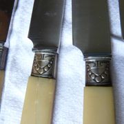 box of 12 stainless steel knives with bakelite handle and silver metal ferrule art decp