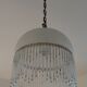 Vintage suspension in half shell speckled with pearls