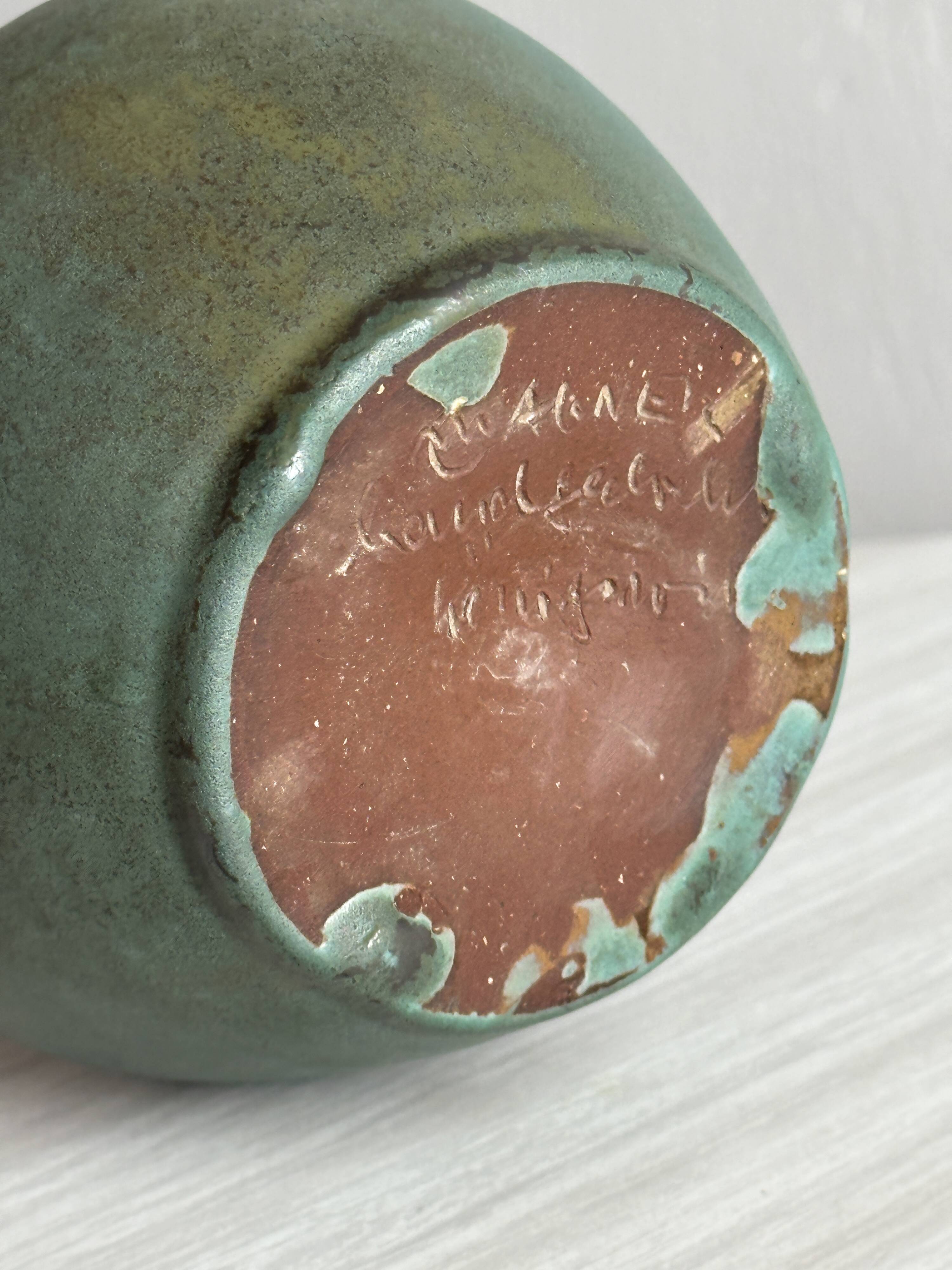 Green glazed ceramic vase