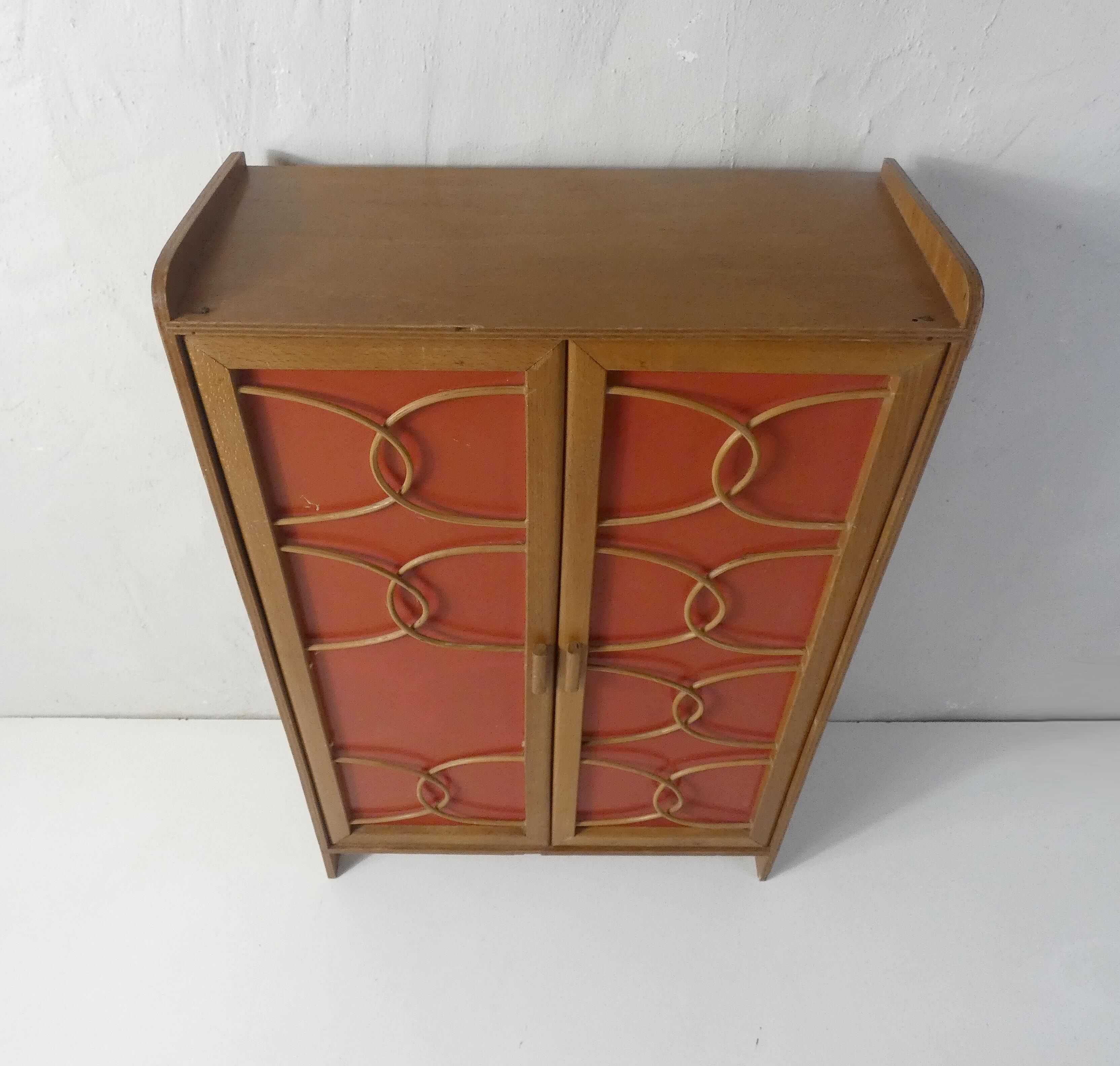 Rattan doll cabinet