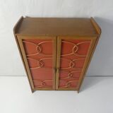 Rattan doll cabinet