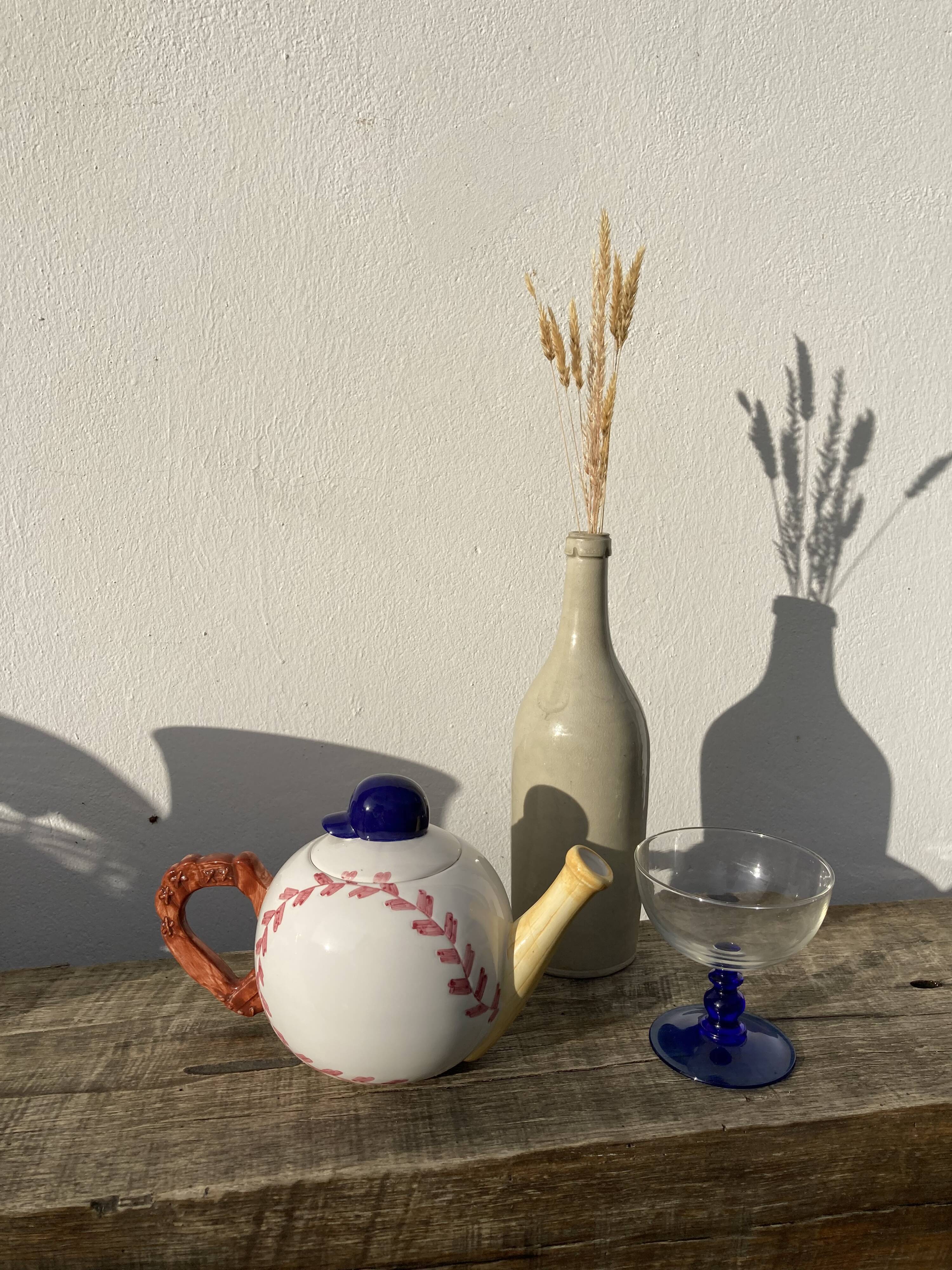 Teapot in white ceramic baseball