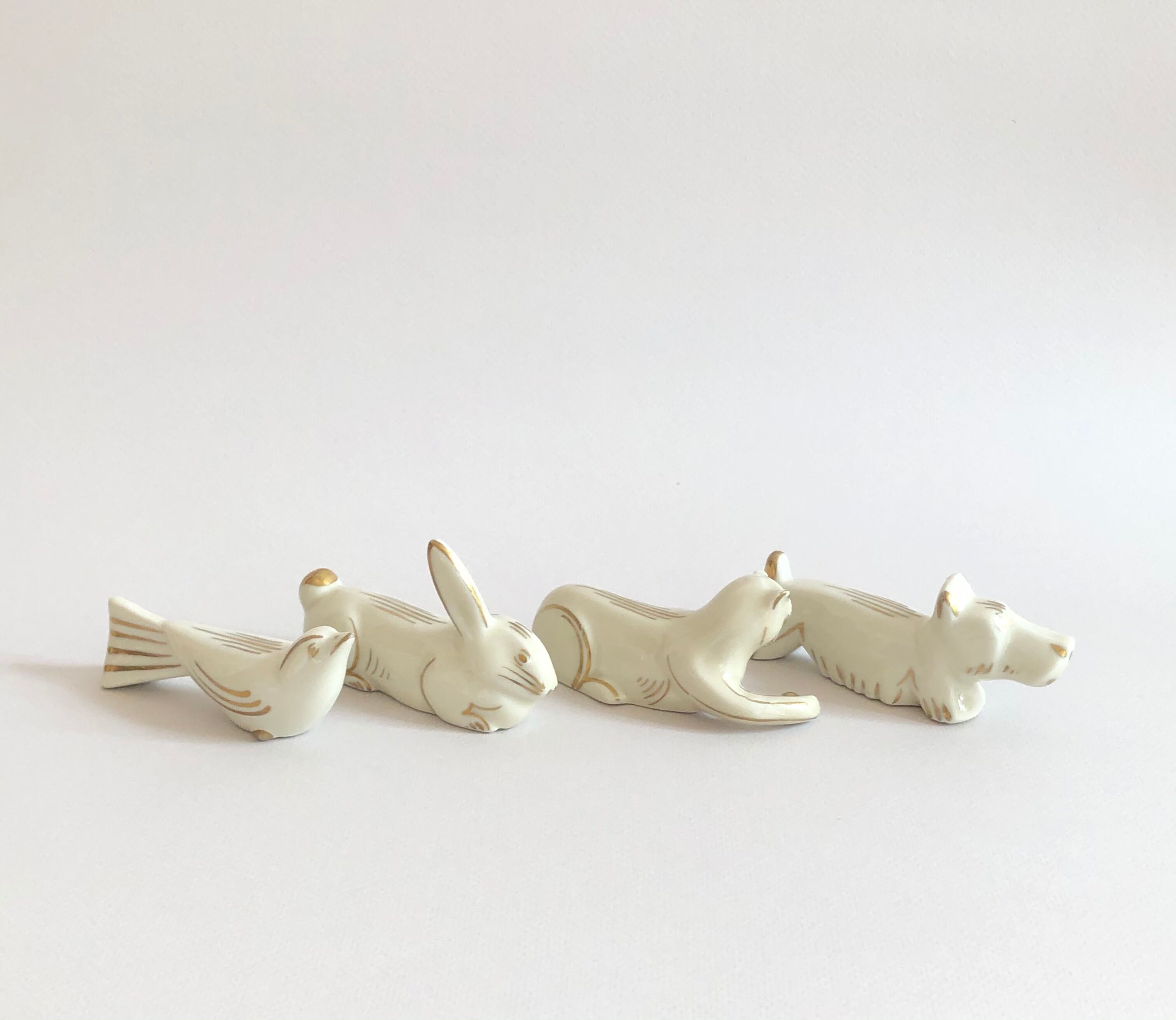 Set of 8 art deco ceramic animal knife holders