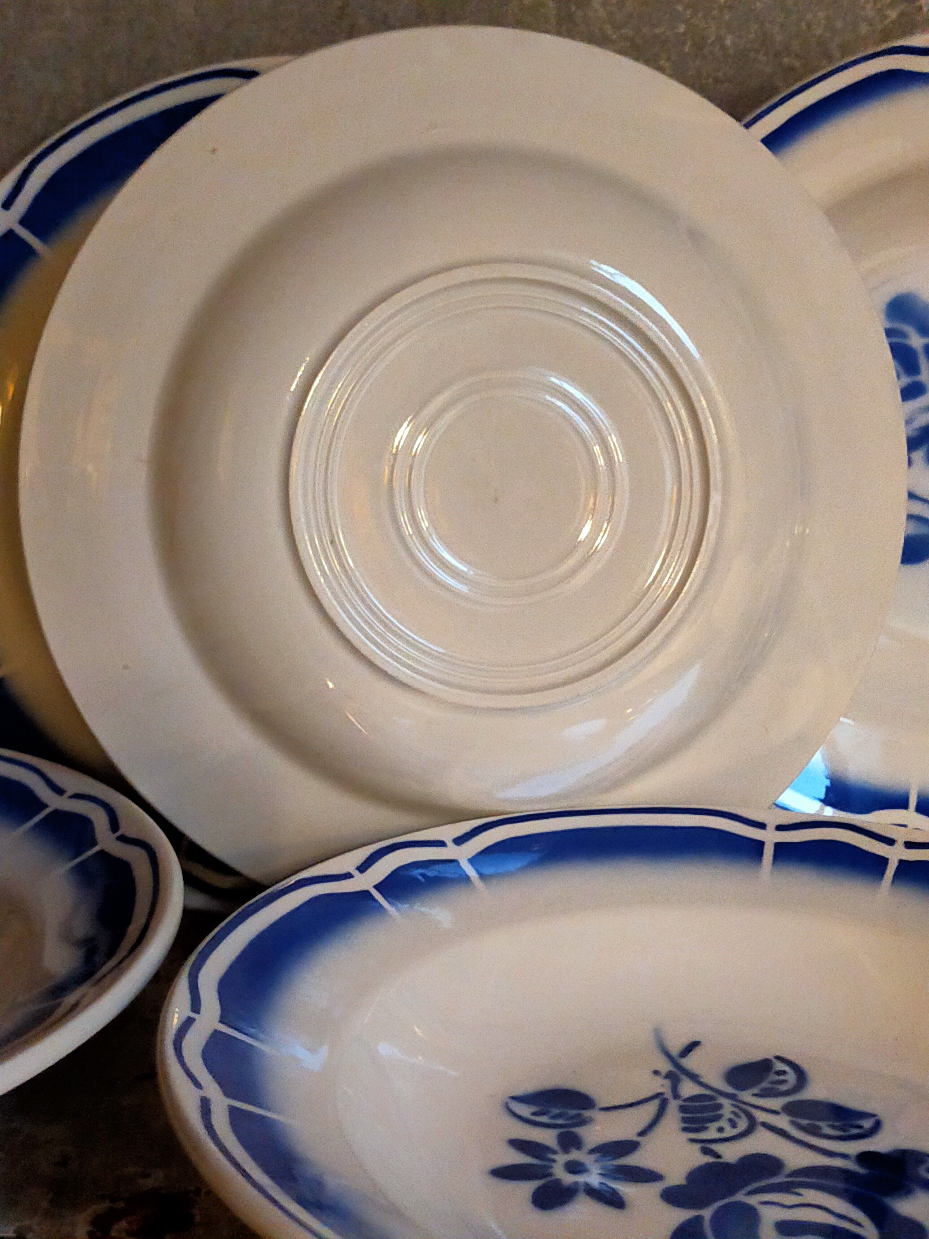 Five old "grandmother" plates with blue flowers