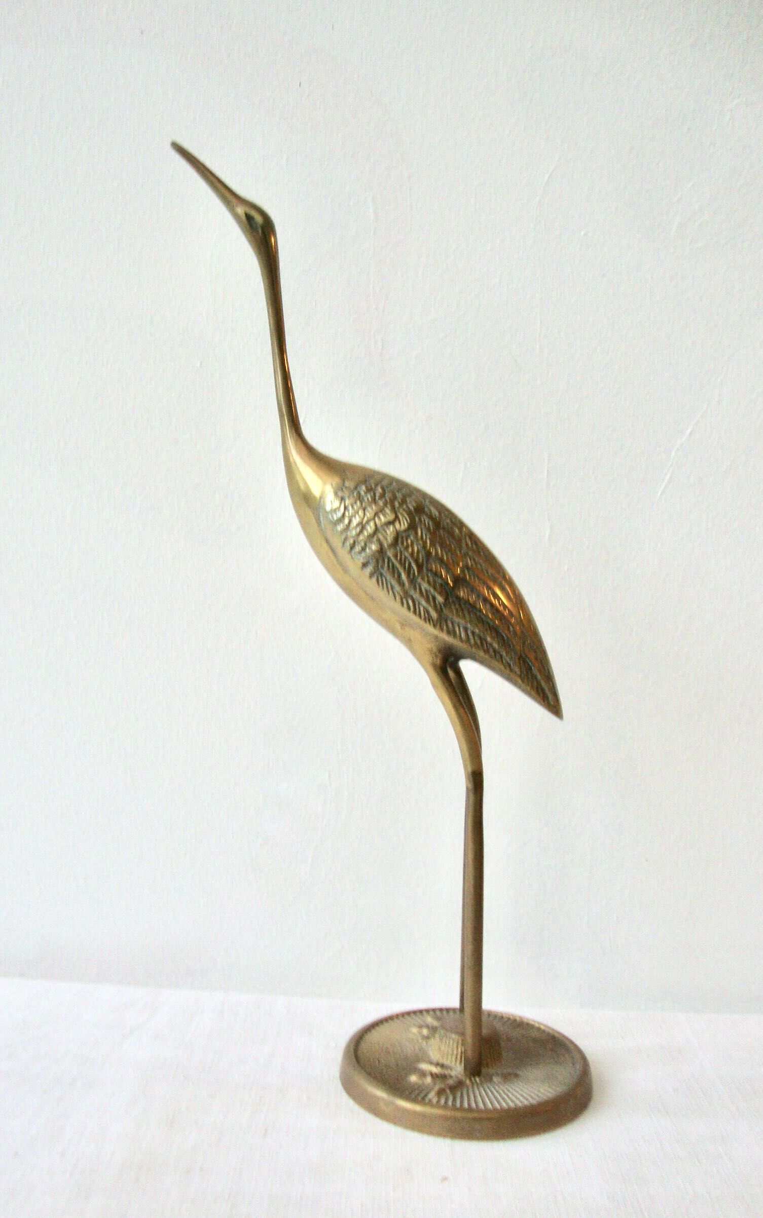 Brass heron