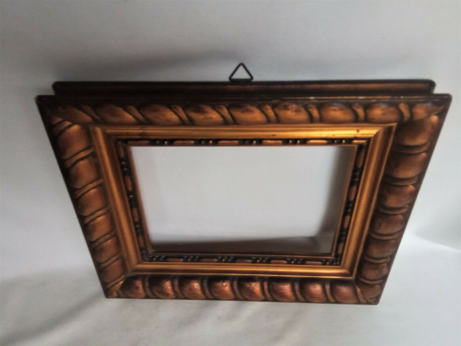 Wooden frame and gilded stucco circa 1900