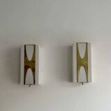 Pair of Loewy wall lights for Hilton, brass and Perspex, France 1965