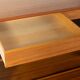Classic shelving system from the 1950s in teak veneer by Poul Cadovius for Cado
