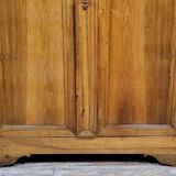 Exceptional Empire period wardrobe in solid walnut, 19th century, circa 1800