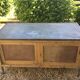 Antique workshop cabinet with sliding doors